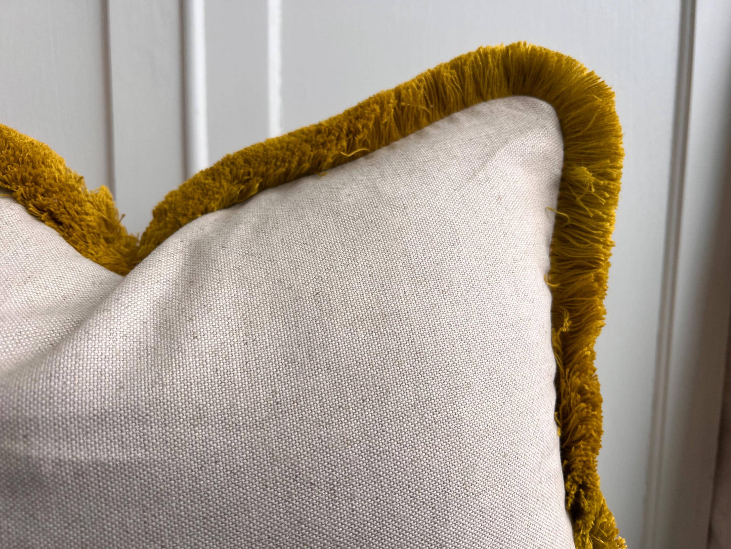 Cushions made in Fermoie Savernake Linen Cushion Cover Burgundy Red Designer Pillow With Mustard Brush Fringe.