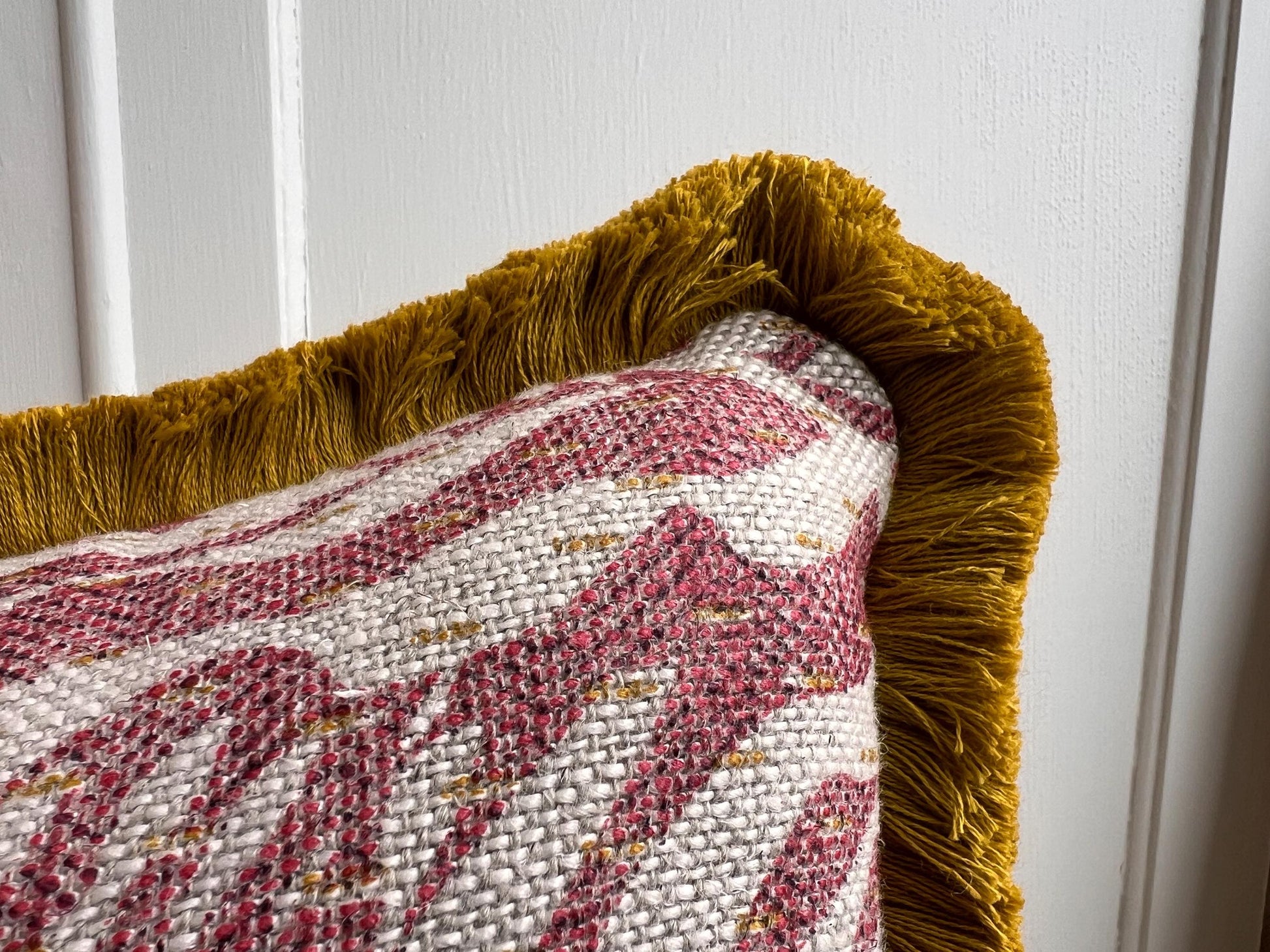 Cushions made in Fermoie Savernake Linen Cushion Cover Burgundy Red Designer Pillow With Mustard Brush Fringe.
