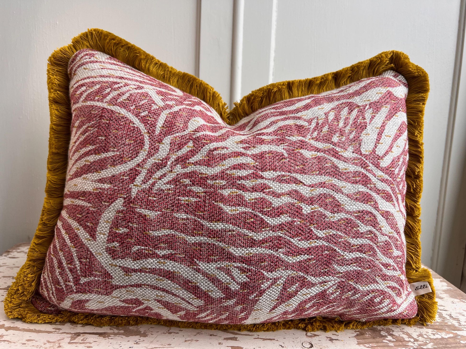 Cushions made in Fermoie Savernake Linen Cushion Cover Burgundy Red Designer Pillow With Mustard Brush Fringe.