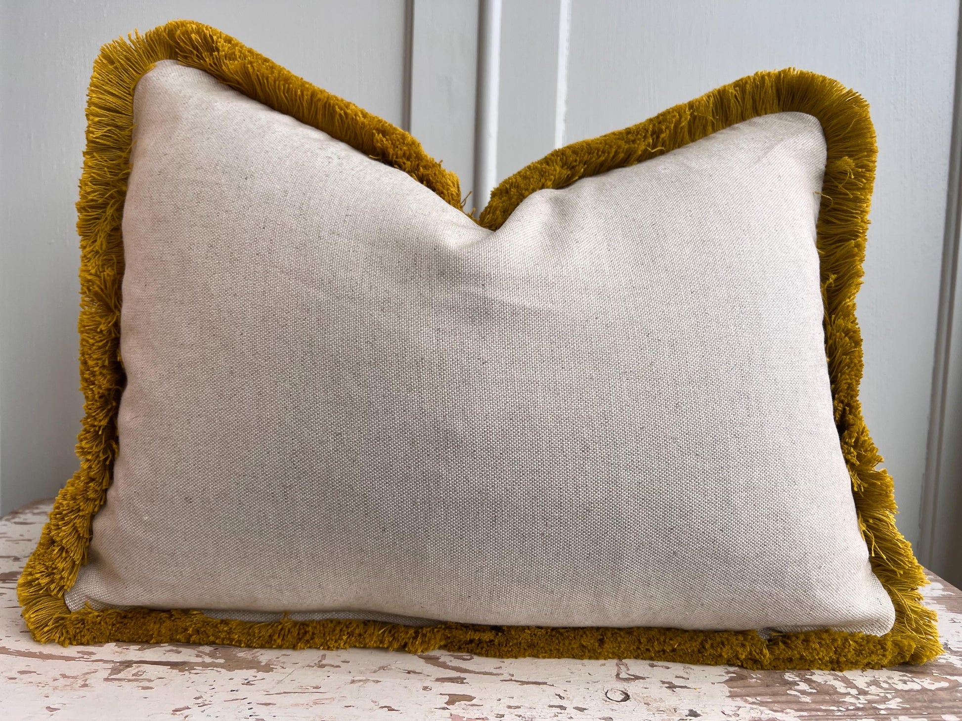 Cushions made in Fermoie Savernake Linen Cushion Cover Burgundy Red Designer Pillow With Mustard Brush Fringe.
