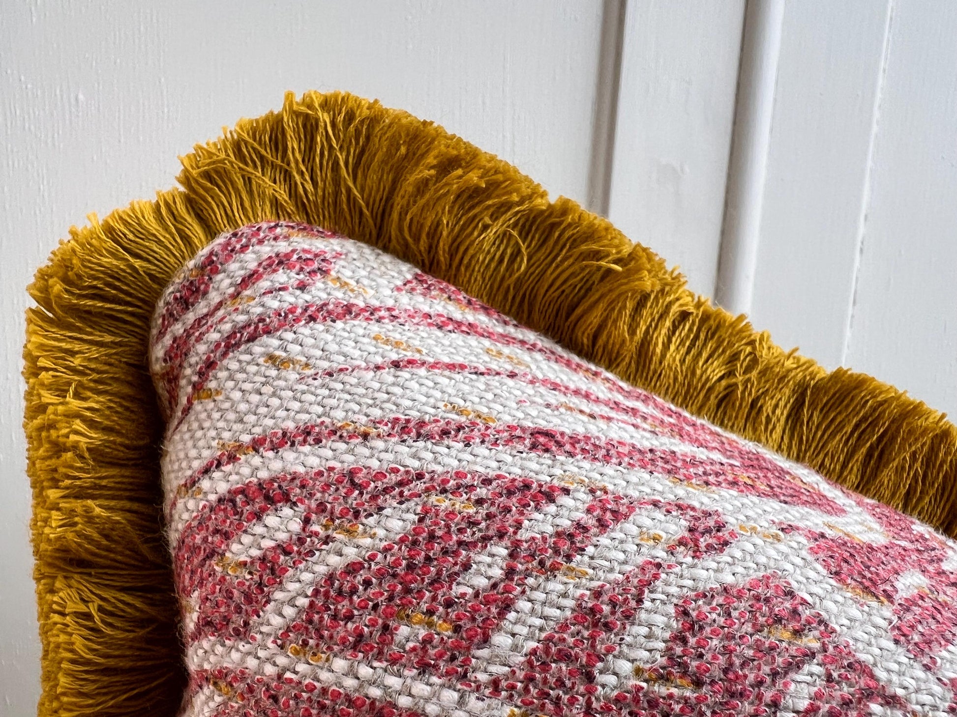 Cushions made in Fermoie Savernake Linen Cushion Cover Burgundy Red Designer Pillow With Mustard Brush Fringe.